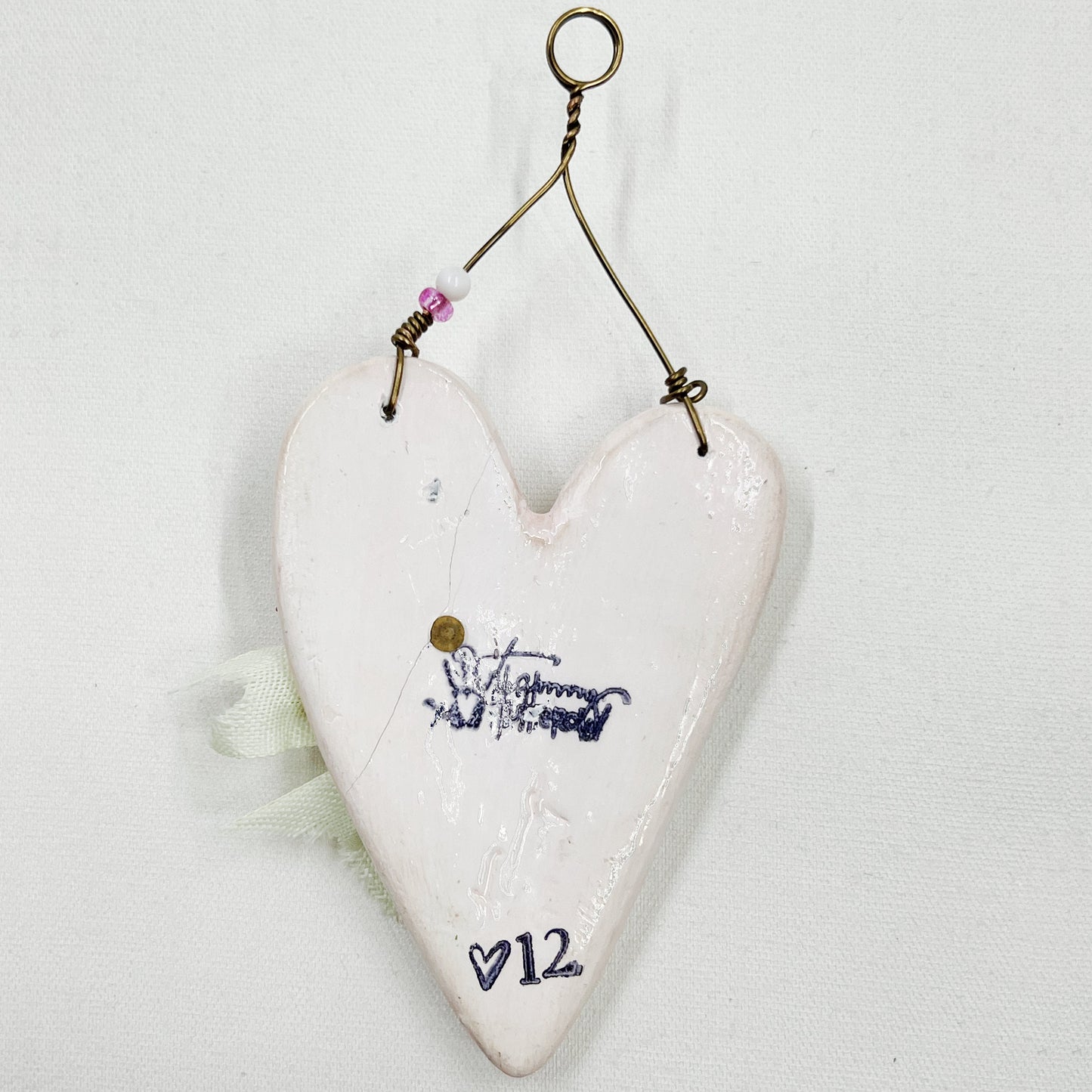 Handmade Heartfelt Ornament 12: hand sculpted heart with mixed media hand-painted enameled flowers by artist Tammy Tutterow
