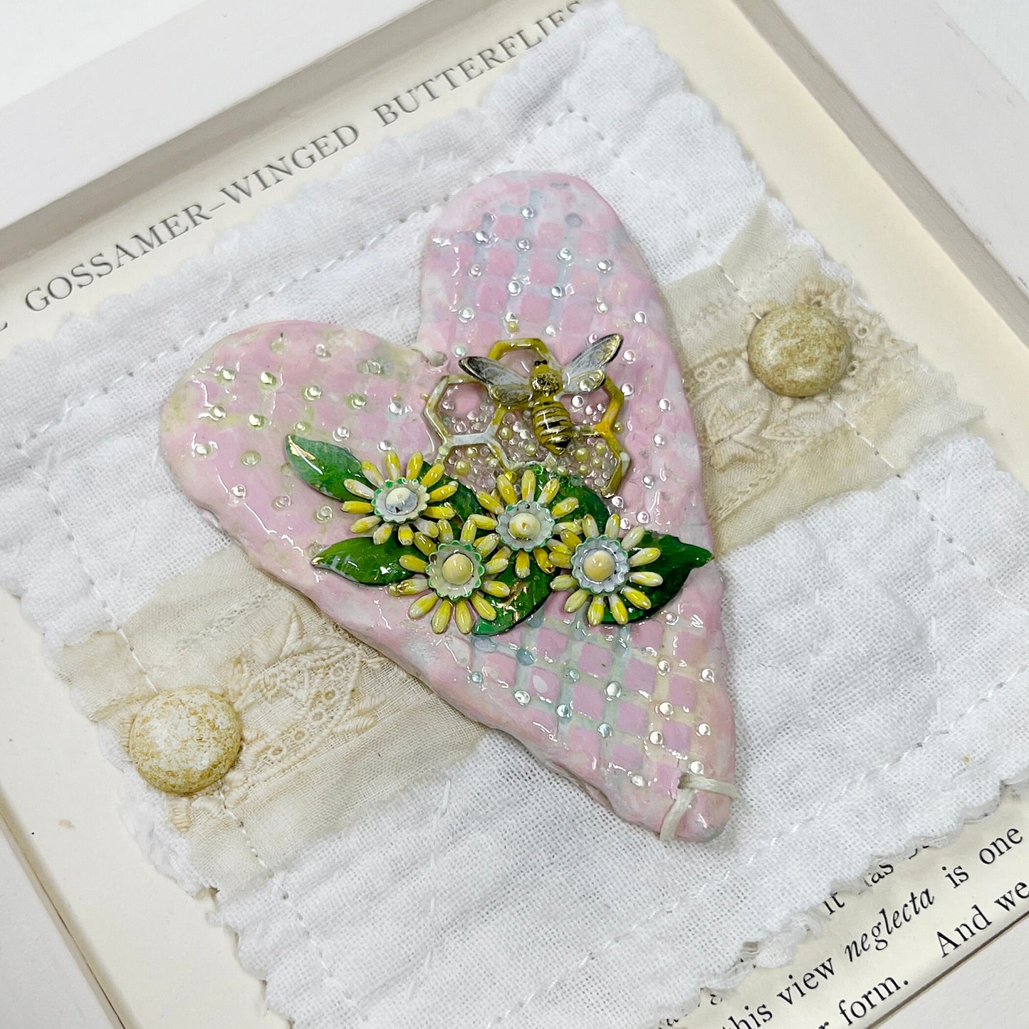 Handmade Heartfelt Sampler 7: framed hand sculpted heart with hand-painted enameled flowers by artist Tammy Tutterow