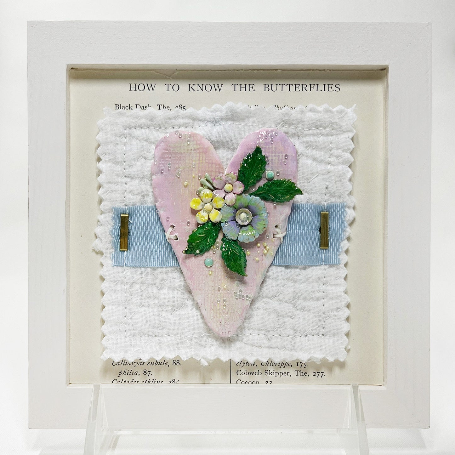 Handmade Heartfelt Sampler 9: framed hand sculpted heart with hand-painted enameled flowers by artist Tammy Tutterow