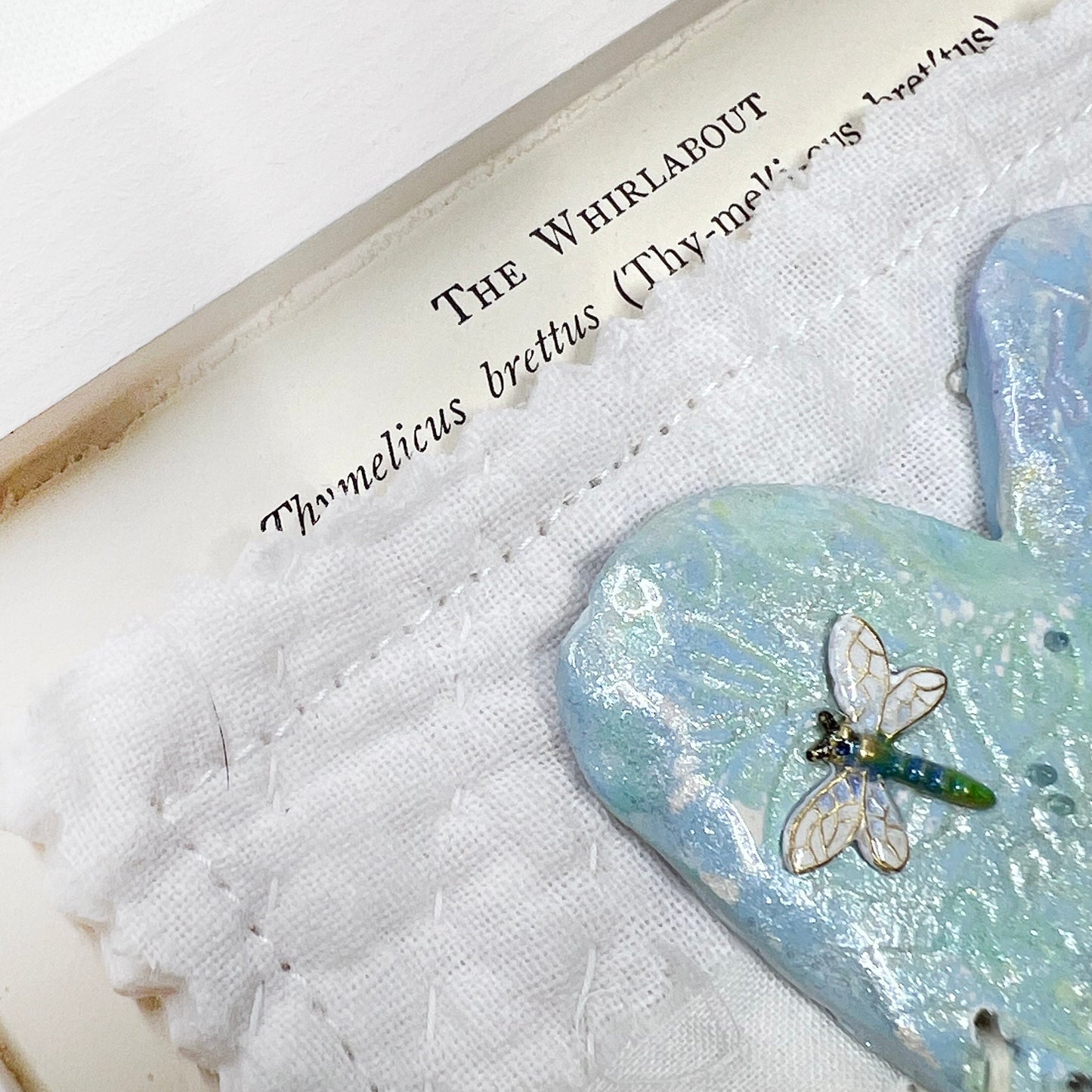 Handmade Heartfelt Sampler 13: framed hand sculpted heart with hand-painted enameled flowers by artist Tammy Tutterow
