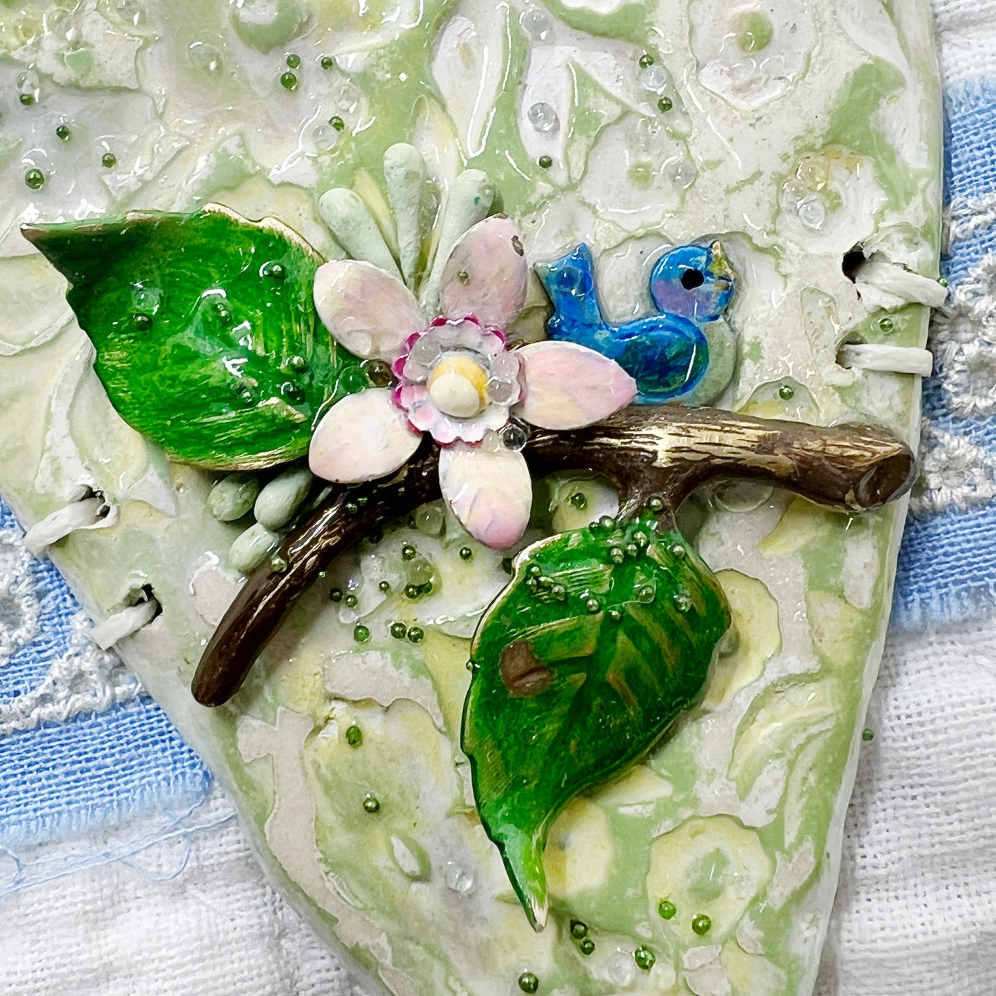 Handmade Heartfelt Sampler 14: framed hand sculpted heart with hand-painted enameled flowers by artist Tammy Tutterow