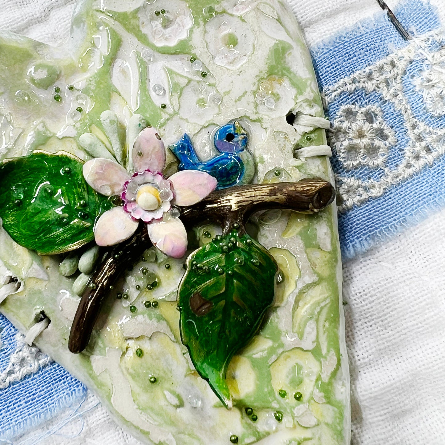 Handmade Heartfelt Sampler 14: framed hand sculpted heart with hand-painted enameled flowers by artist Tammy Tutterow