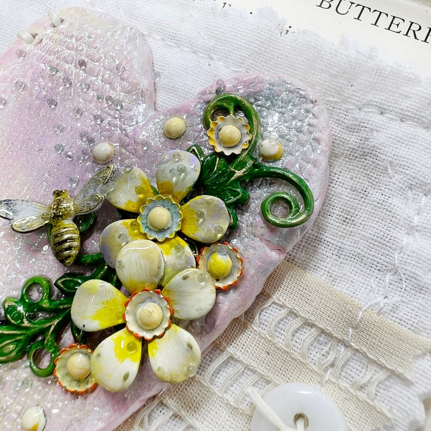 Handmade Heartfelt Sampler 15: framed hand sculpted heart with hand-painted enameled flowers by artist Tammy Tutterow