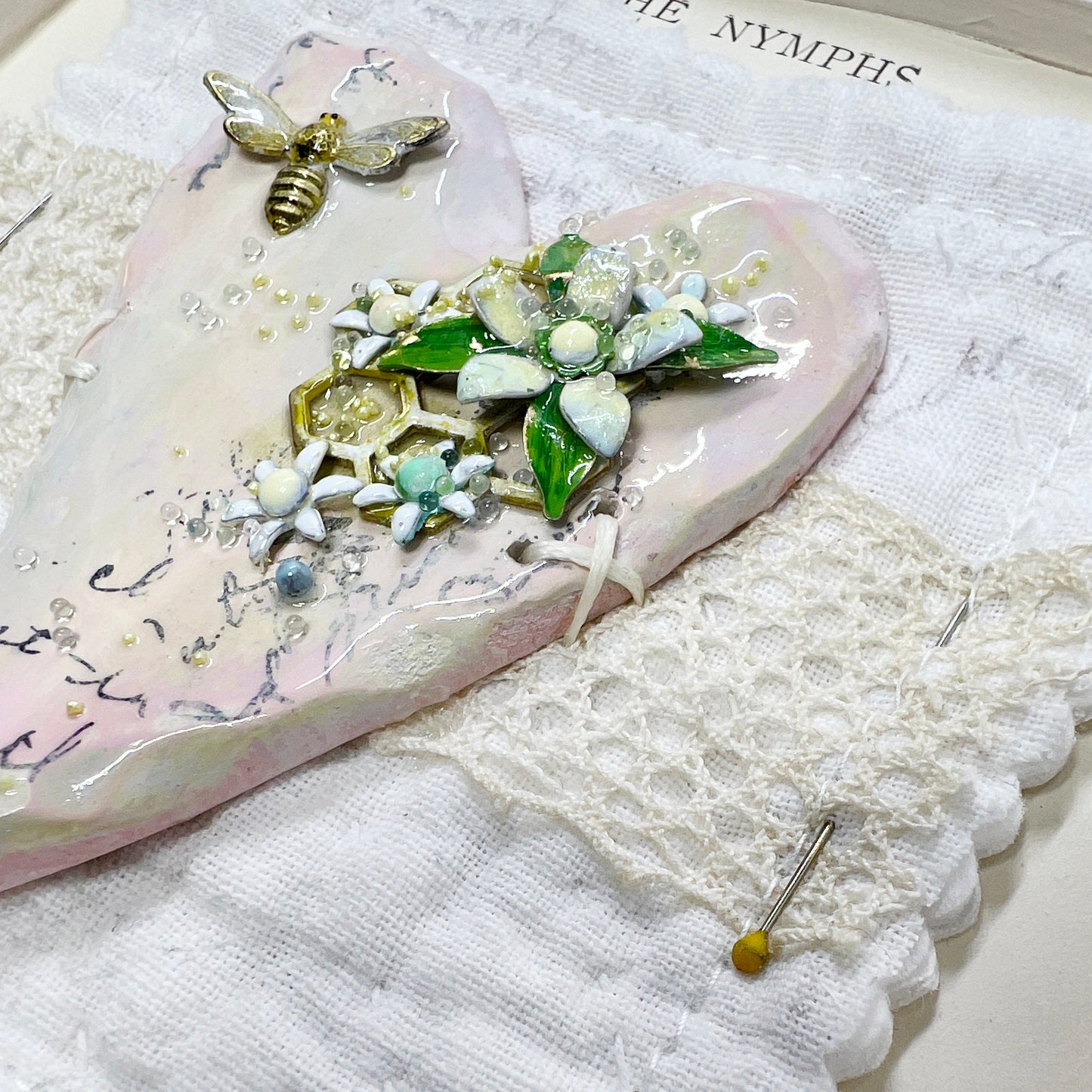Handmade Heartfelt Sampler 16: framed hand sculpted heart with hand-painted enameled flowers by artist Tammy Tutterow