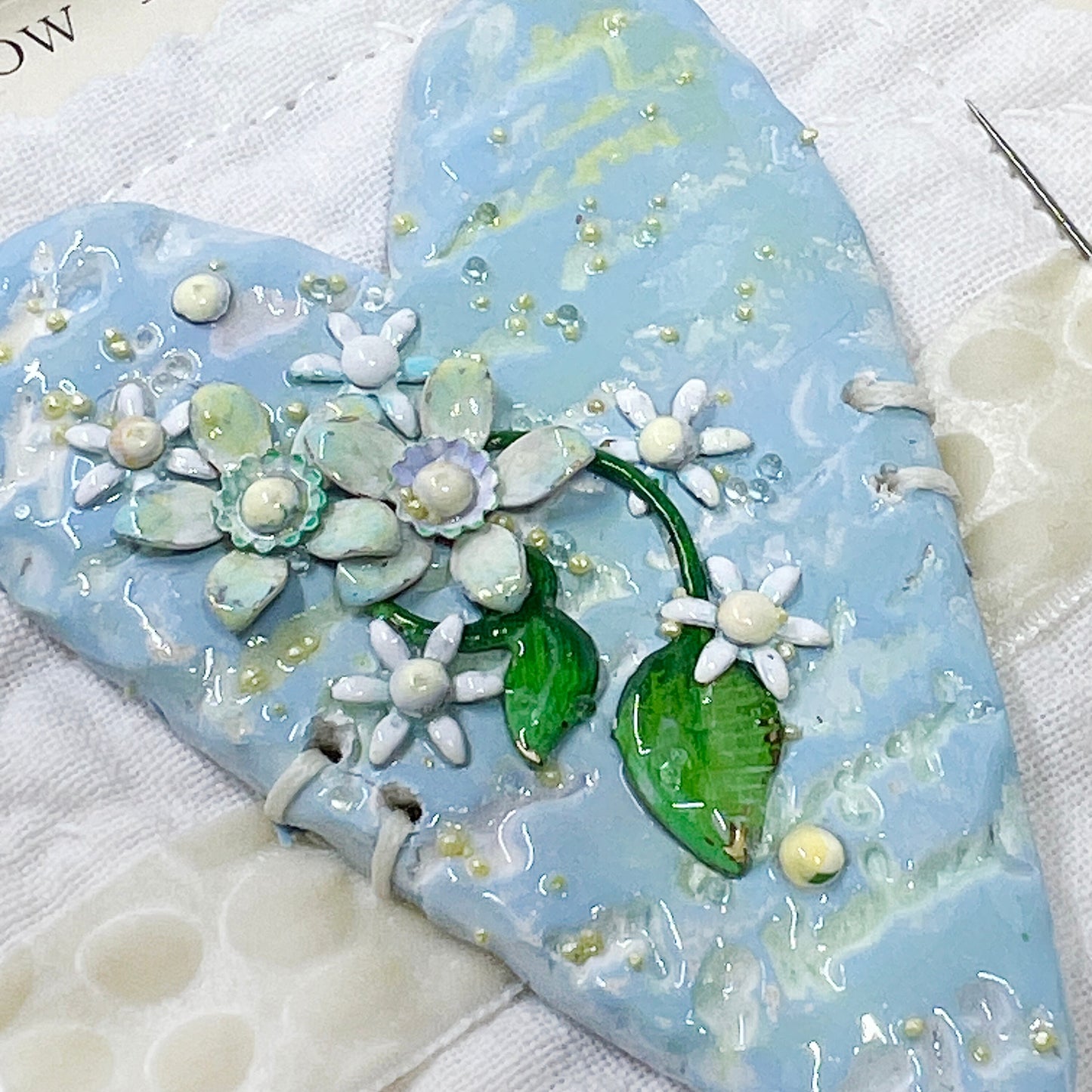 Handmade Heartfelt Sampler 17: framed hand sculpted heart with hand-painted enameled flowers by artist Tammy Tutterow
