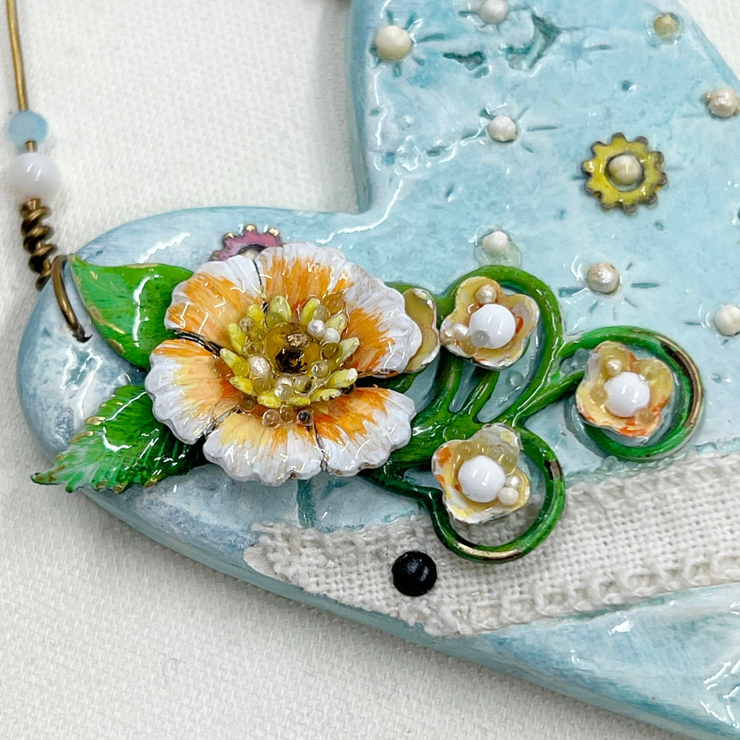 Handmade Heartfelt Ornament 1: hand sculpted heart with mixed media hand-painted enameled flowers by artist Tammy Tutterow