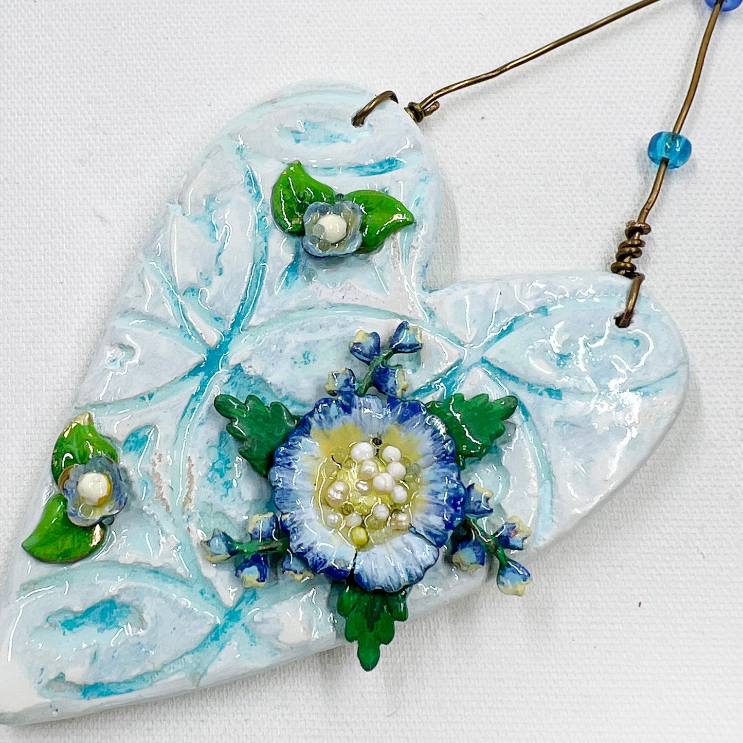 Handmade Heartfelt Ornament 2: hand sculpted heart with mixed media hand-painted enameled flowers by artist Tammy Tutterow