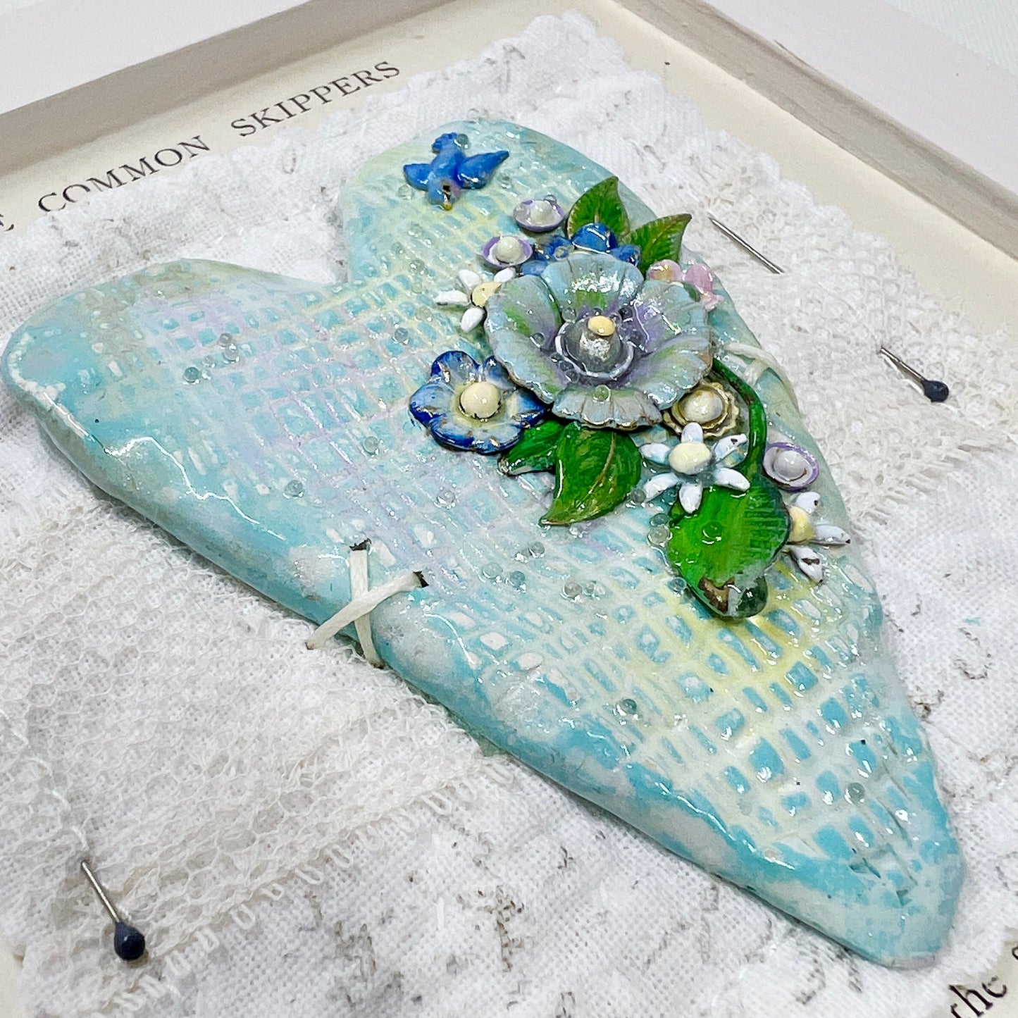 Handmade Heartfelt Sampler 3: framed hand sculpted heart with hand-painted enameled flowers by artist Tammy Tutterow