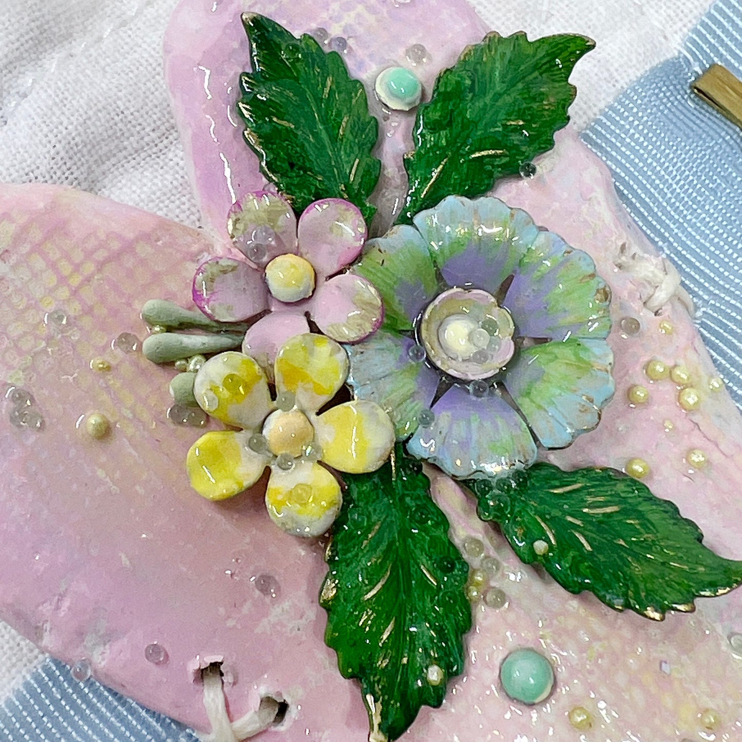 Handmade Heartfelt Sampler 9: framed hand sculpted heart with hand-painted enameled flowers by artist Tammy Tutterow