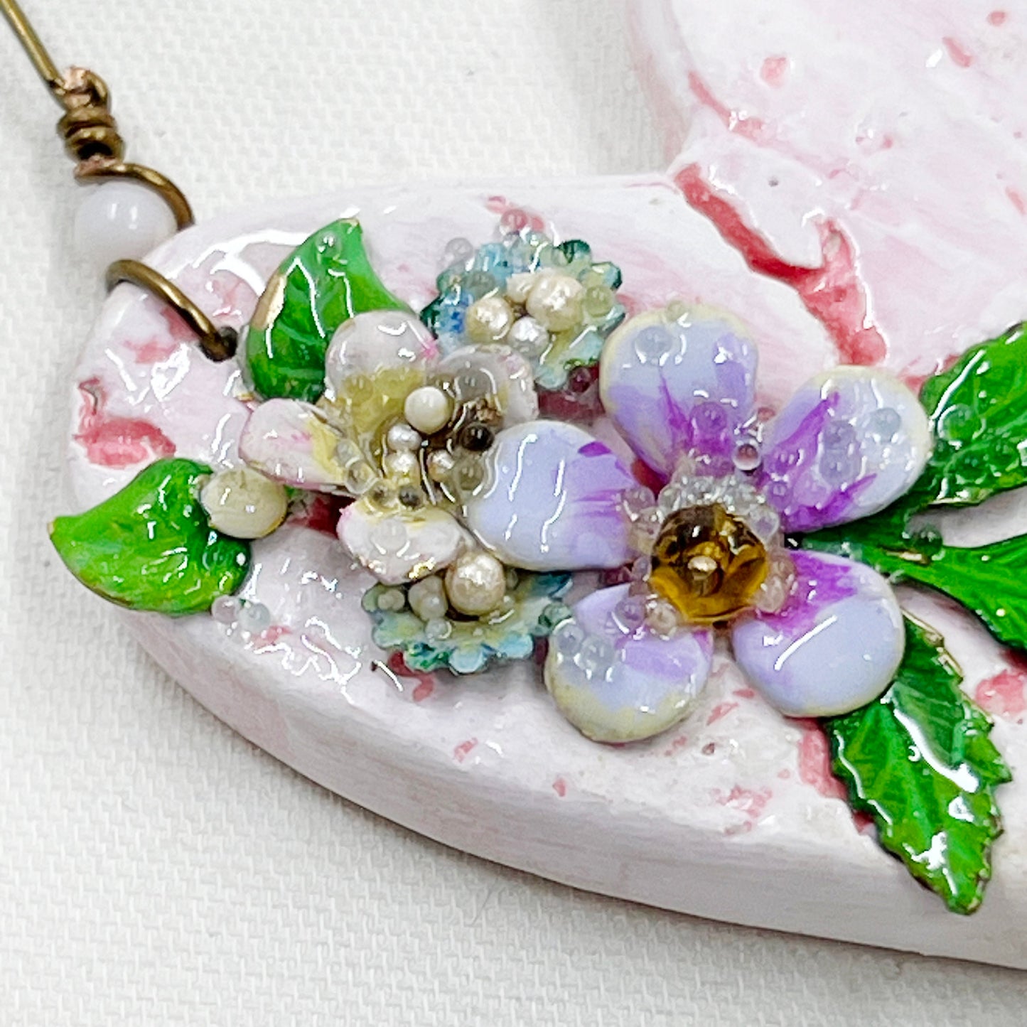 Handmade Heartfelt Ornament 3: hand sculpted heart with mixed media hand-painted enameled flowers by artist Tammy Tutterow