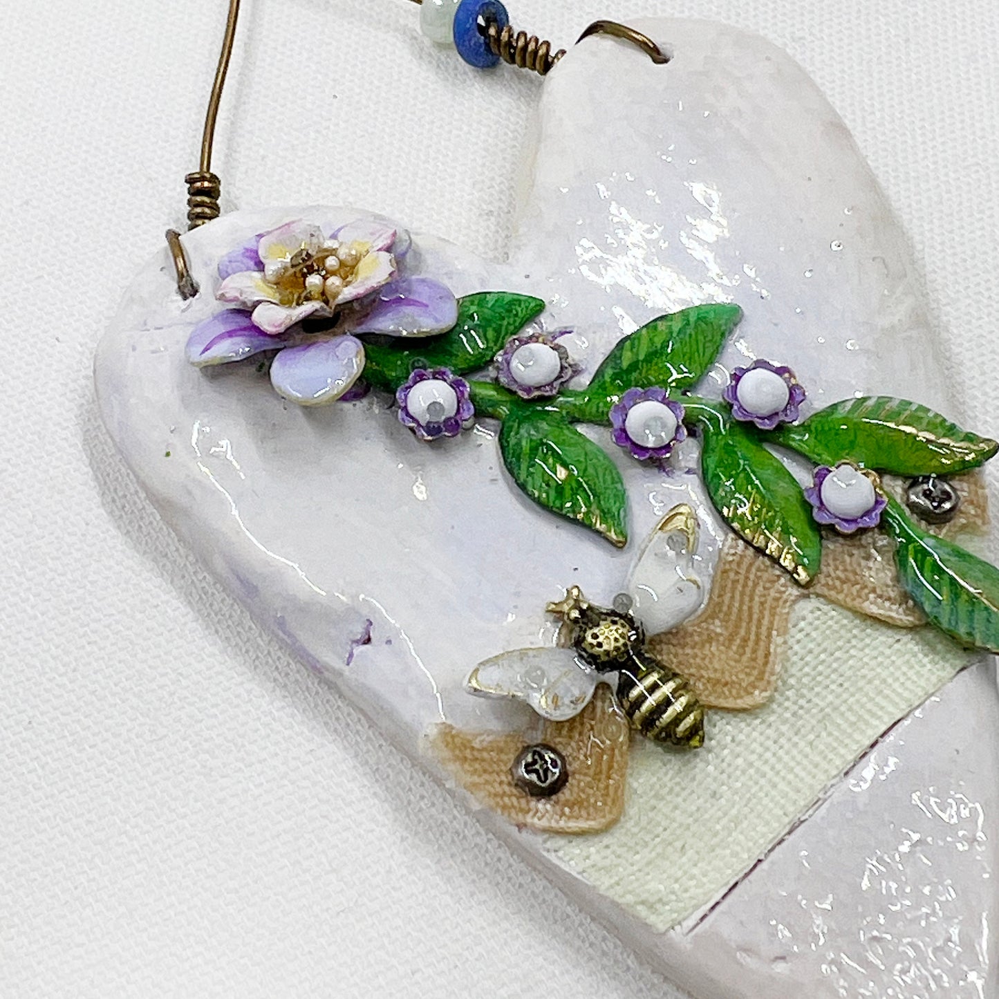 Handmade Heartfelt Ornament 6: hand sculpted heart with mixed media hand-painted enameled flowers by artist Tammy Tutterow