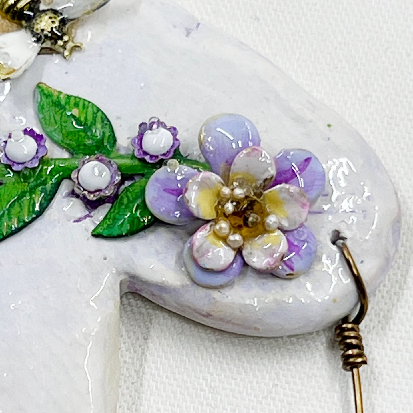Handmade Heartfelt Ornament 6: hand sculpted heart with mixed media hand-painted enameled flowers by artist Tammy Tutterow