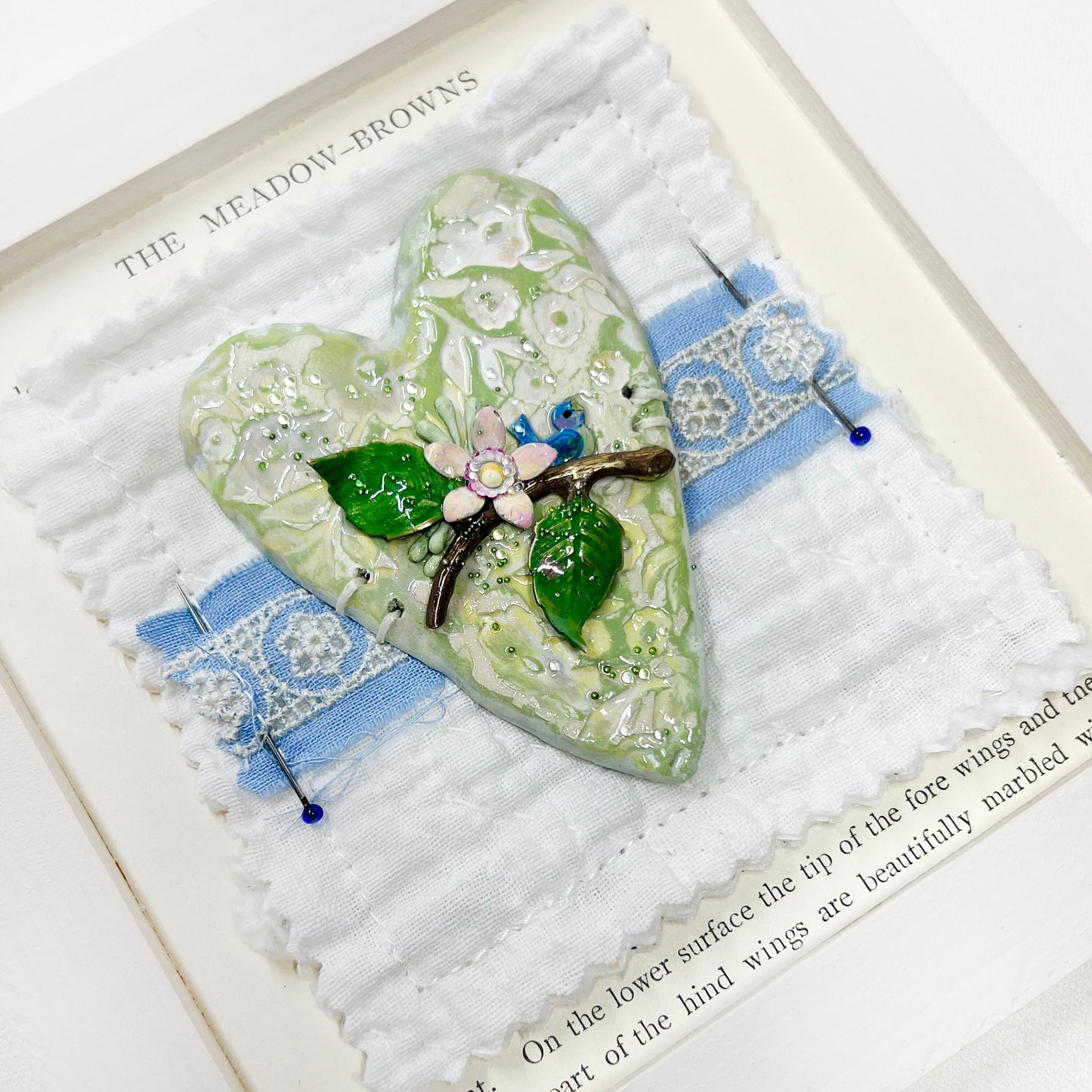 Handmade Heartfelt Sampler 14: framed hand sculpted heart with hand-painted enameled flowers by artist Tammy Tutterow