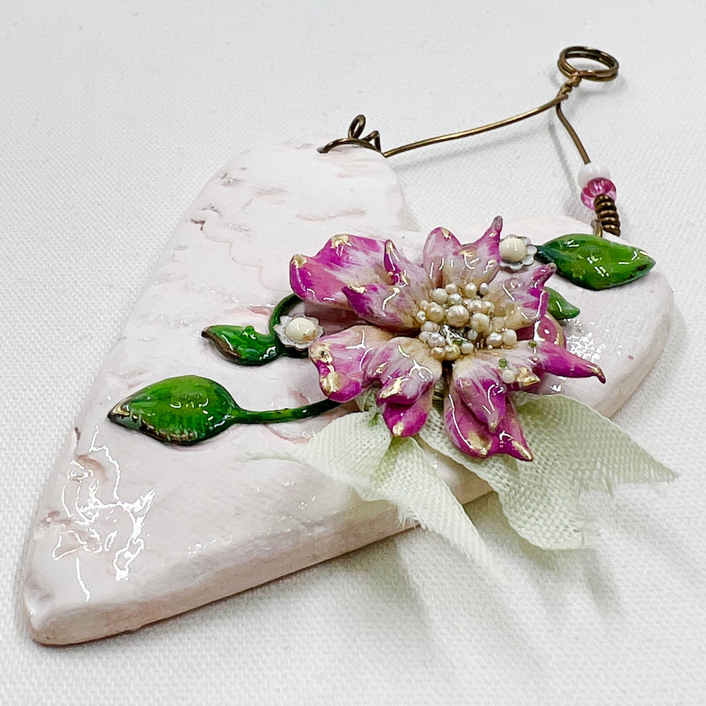 Handmade Heartfelt Ornament 12: hand sculpted heart with mixed media hand-painted enameled flowers by artist Tammy Tutterow
