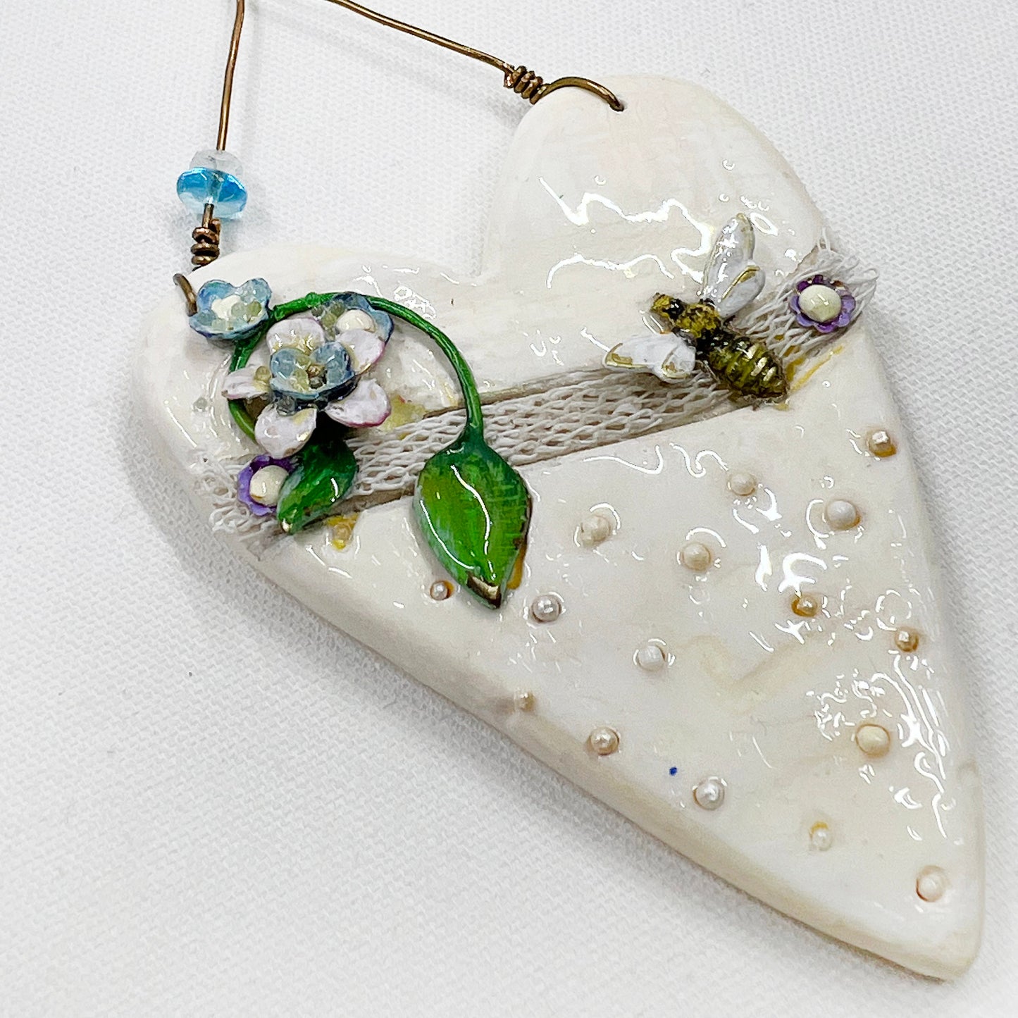 Handmade Heartfelt Ornament 14: hand sculpted heart with mixed media hand-painted enameled flowers by artist Tammy Tutterow