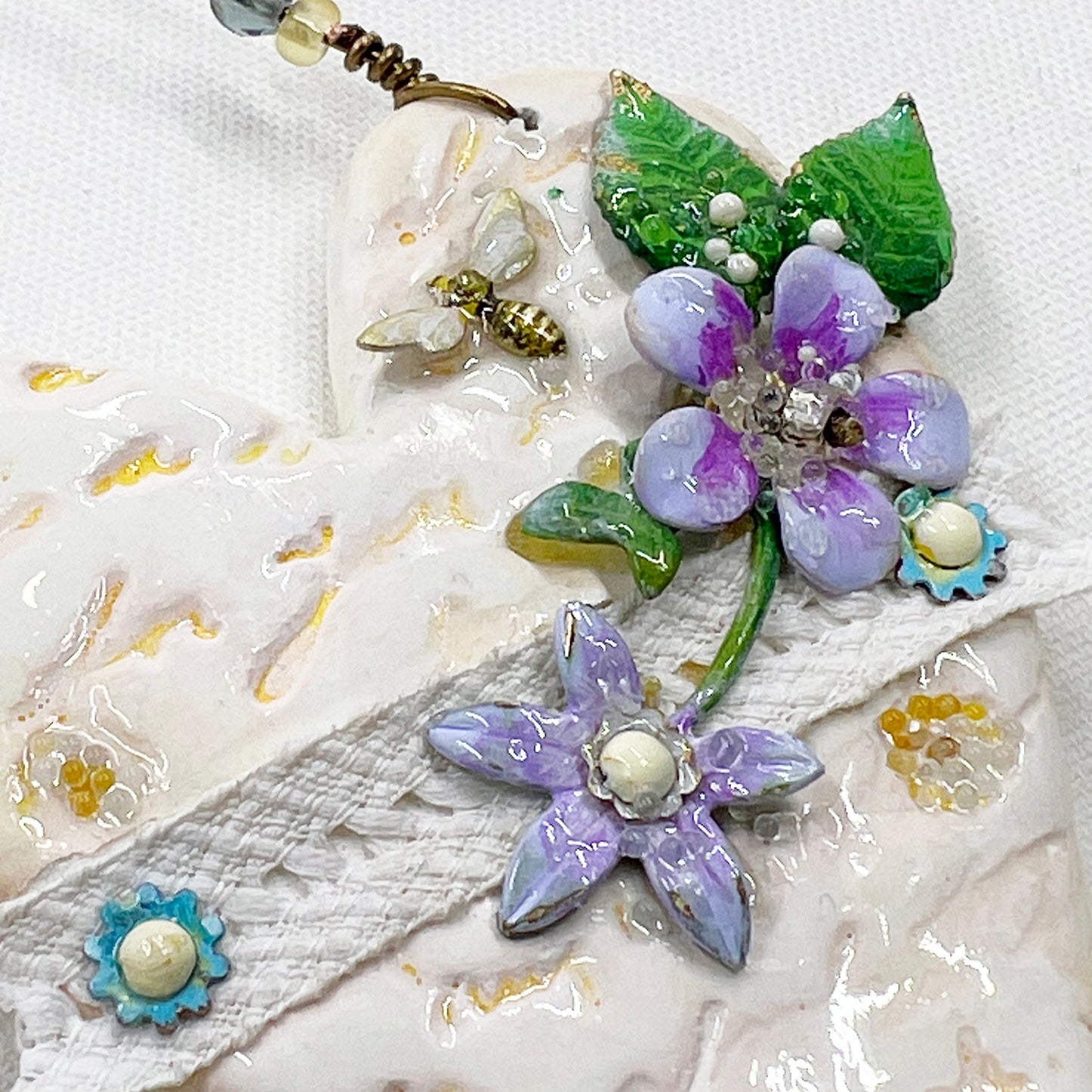 Handmade Heartfelt Ornament 16: hand sculpted heart with mixed media hand-painted enameled flowers by artist Tammy Tutterow