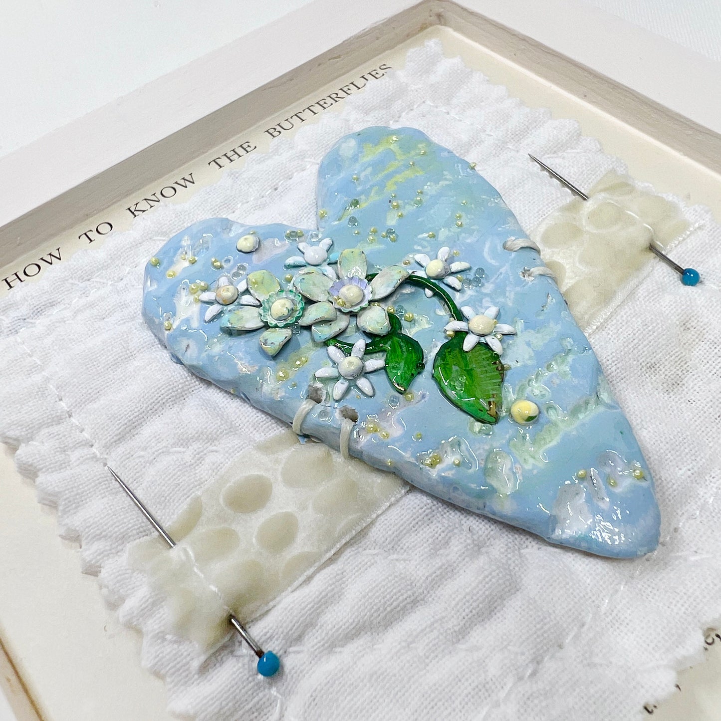 Handmade Heartfelt Sampler 17: framed hand sculpted heart with hand-painted enameled flowers by artist Tammy Tutterow