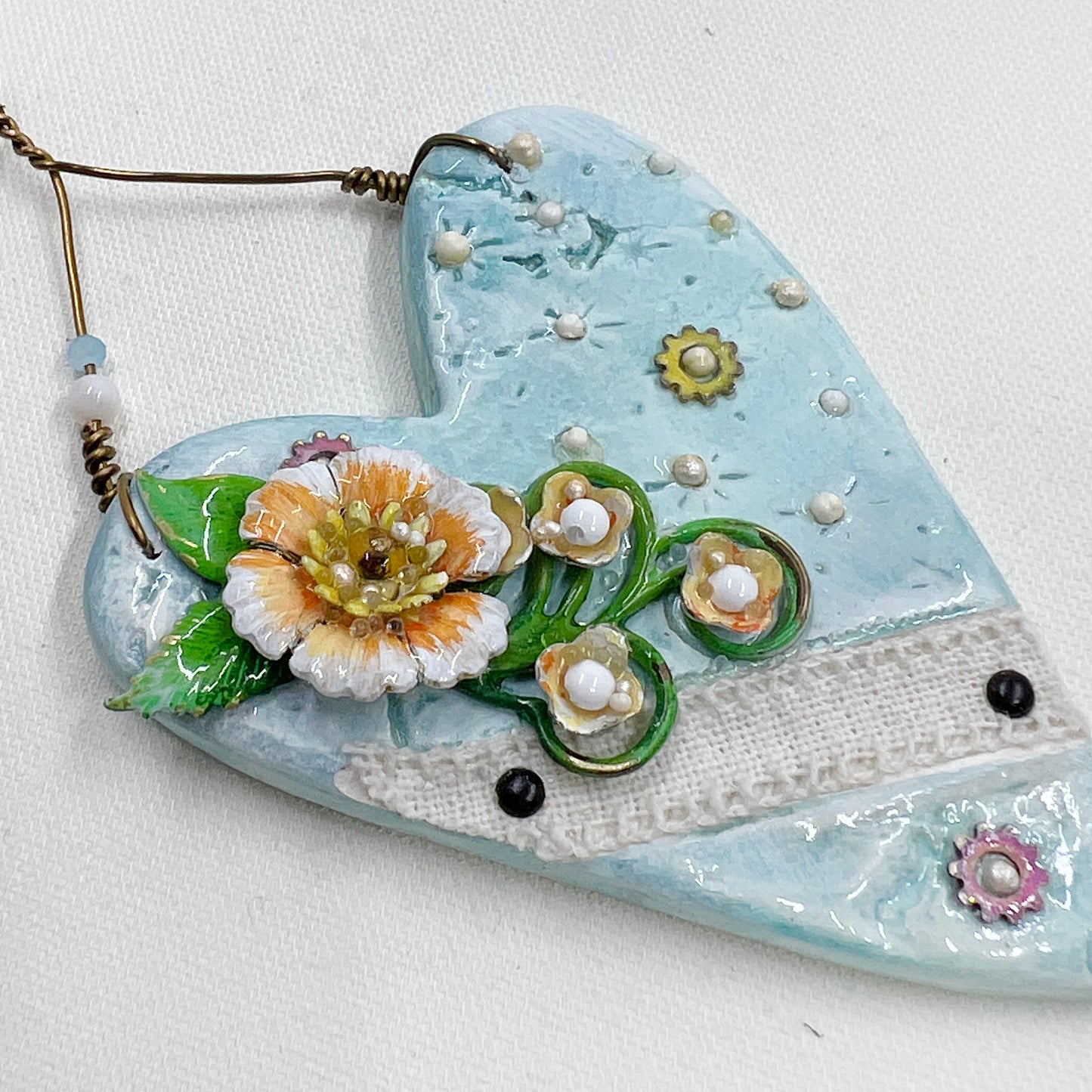 Handmade Heartfelt Ornament 1: hand sculpted heart with mixed media hand-painted enameled flowers by artist Tammy Tutterow