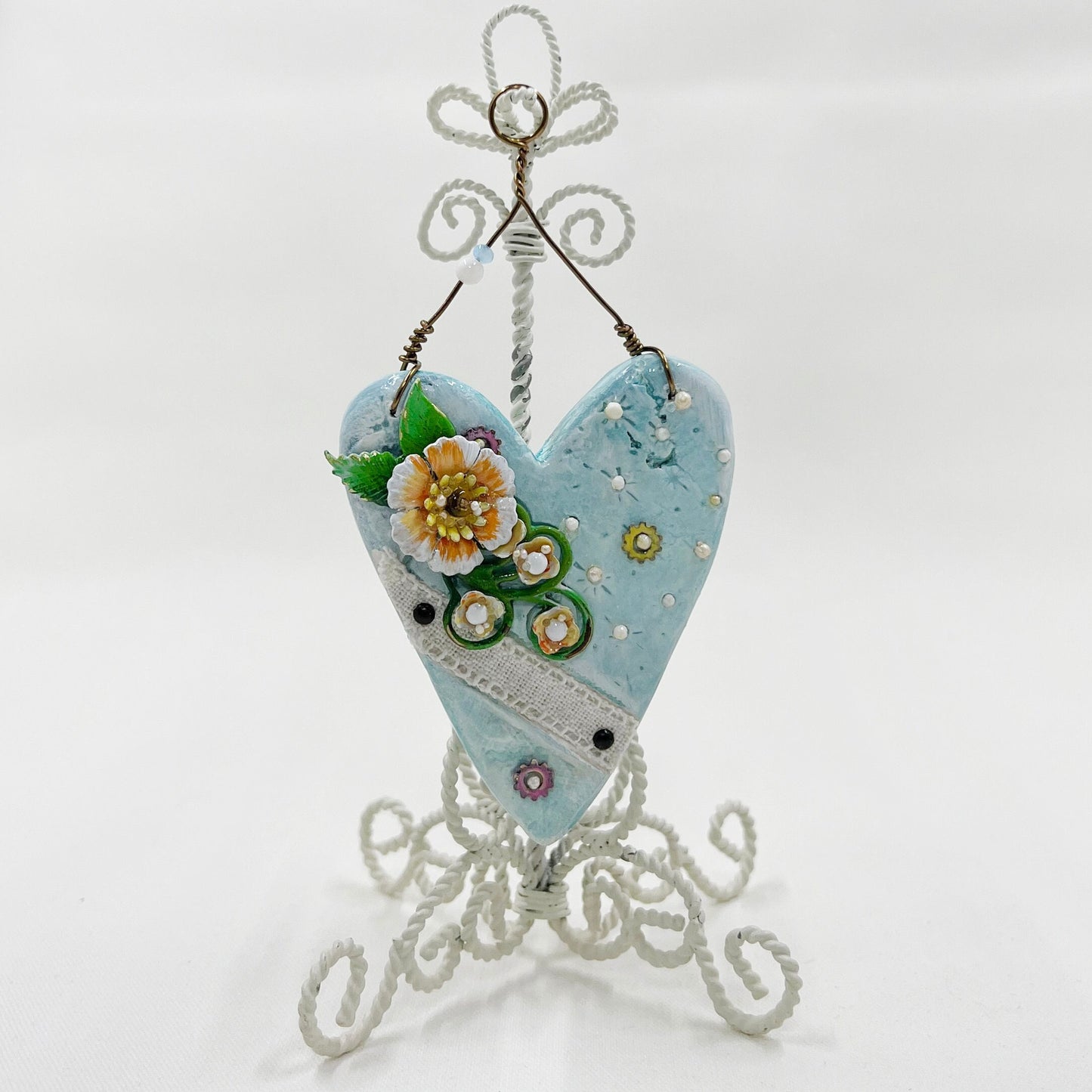 Handmade Heartfelt Ornament 1: hand sculpted heart with mixed media hand-painted enameled flowers by artist Tammy Tutterow