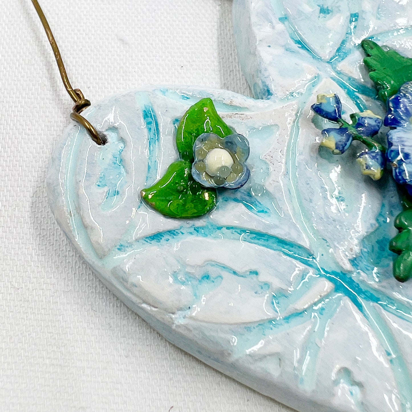 Handmade Heartfelt Ornament 2: hand sculpted heart with mixed media hand-painted enameled flowers by artist Tammy Tutterow