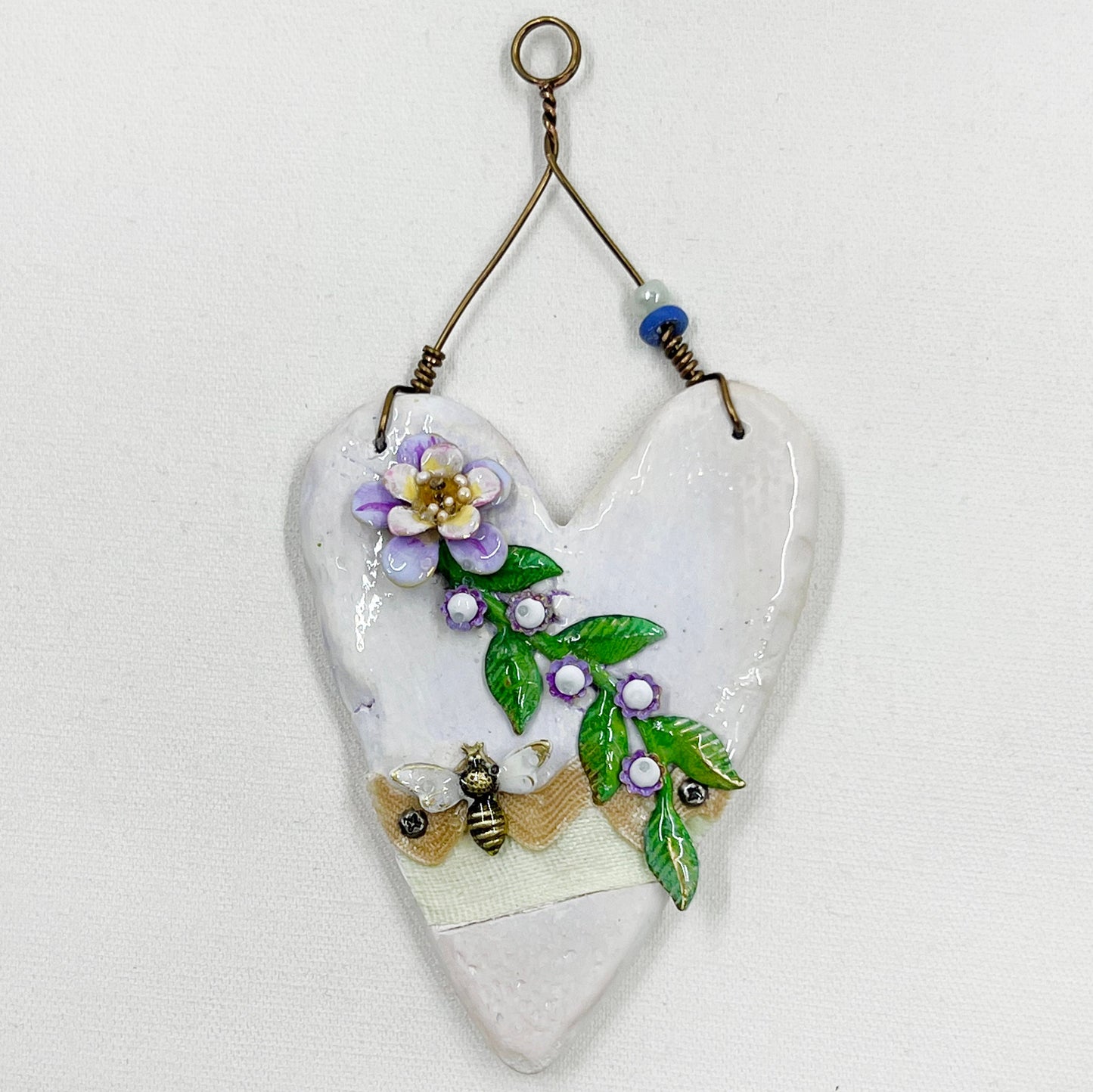 Handmade Heartfelt Ornament 6: hand sculpted heart with mixed media hand-painted enameled flowers by artist Tammy Tutterow