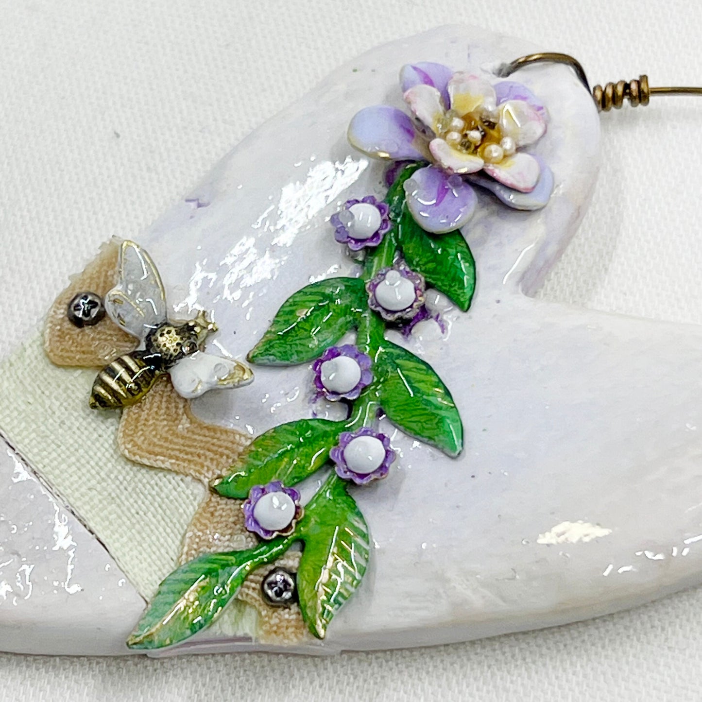 Handmade Heartfelt Ornament 6: hand sculpted heart with mixed media hand-painted enameled flowers by artist Tammy Tutterow