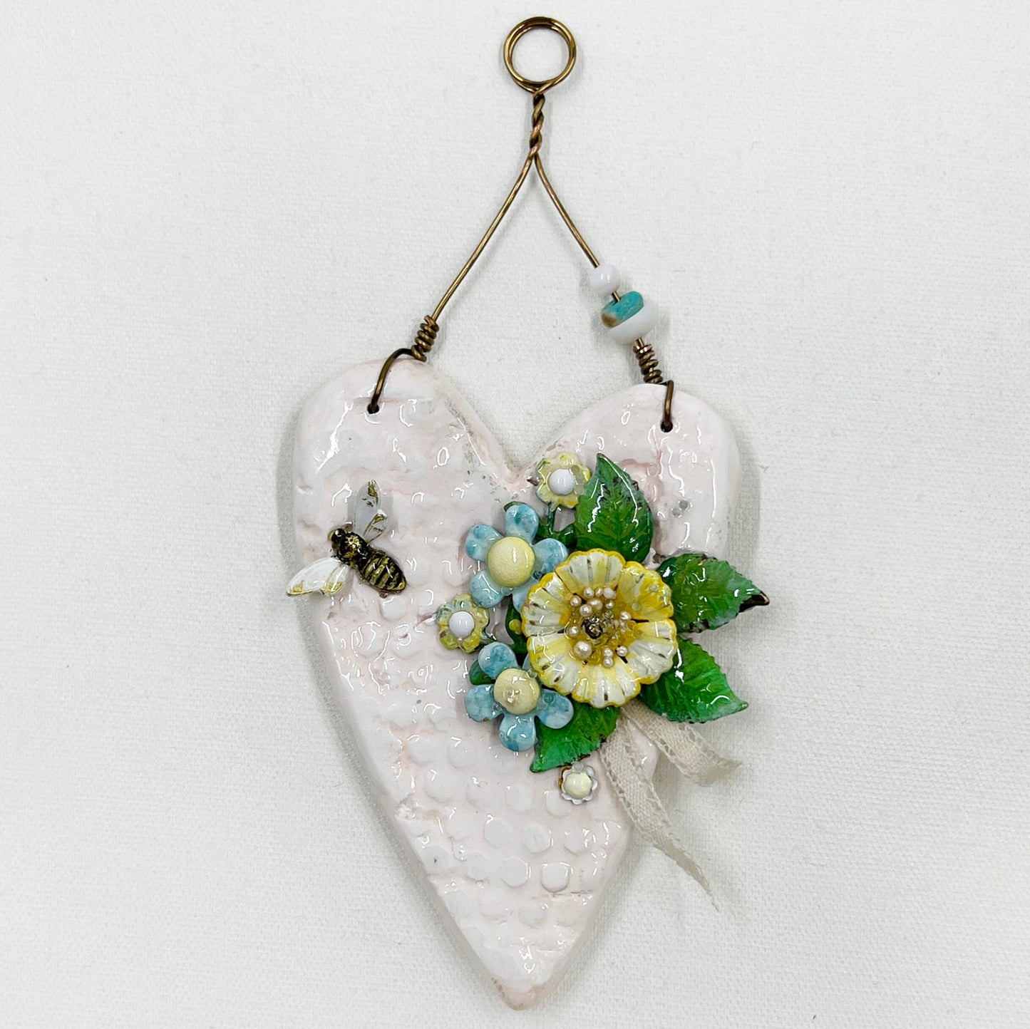 Handmade Heartfelt Ornament 7: hand sculpted heart with mixed media hand-painted enameled flowers by artist Tammy Tutterow