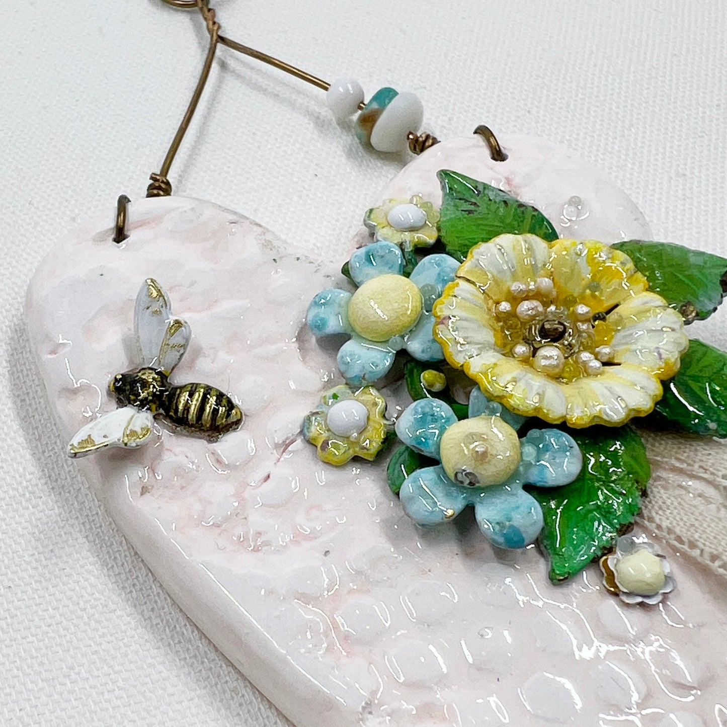 Handmade Heartfelt Ornament 7: hand sculpted heart with mixed media hand-painted enameled flowers by artist Tammy Tutterow