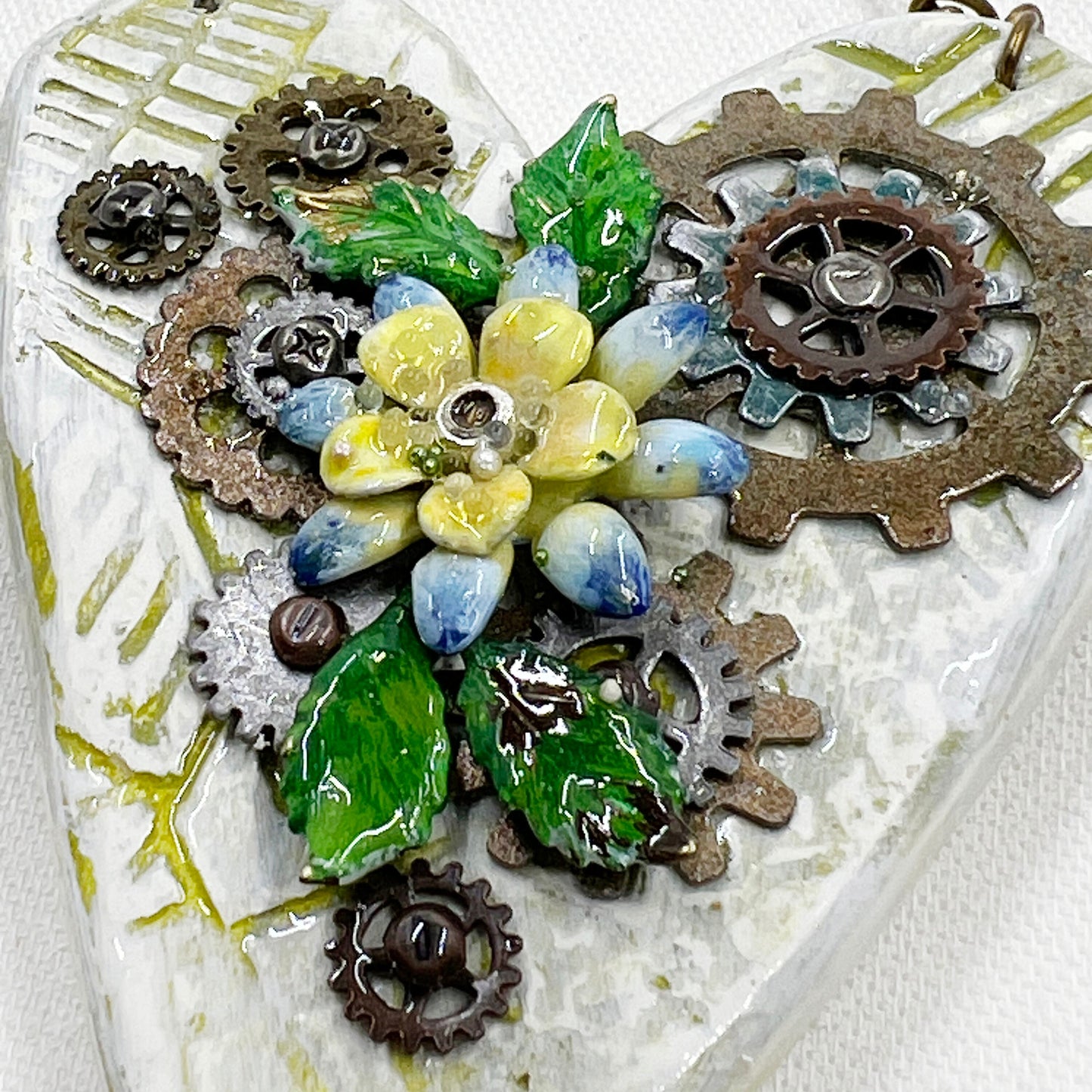 Handmade Heartfelt Ornament 10: hand sculpted heart with mixed media hand-painted enameled flowers by artist Tammy Tutterow