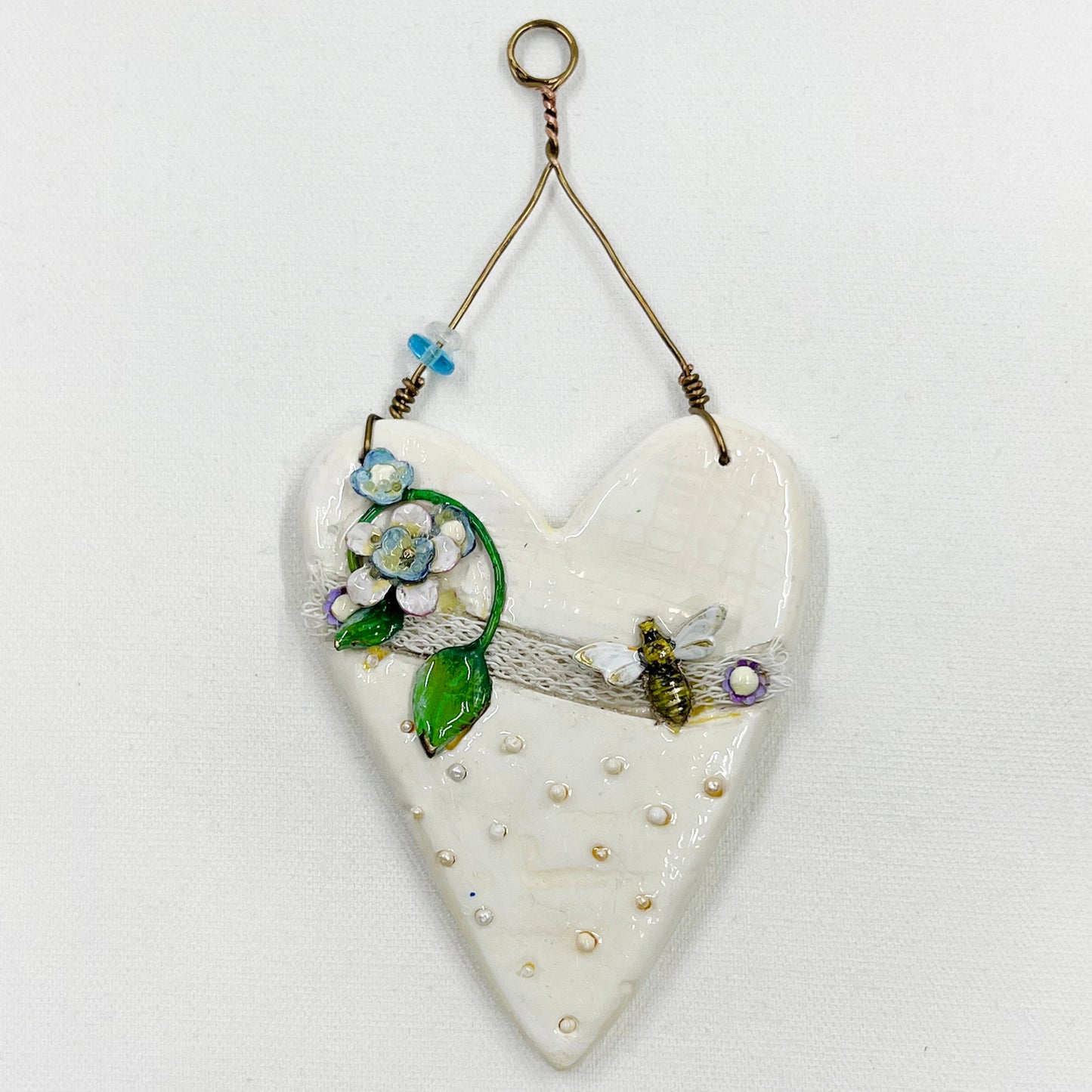 Handmade Heartfelt Ornament 14: hand sculpted heart with mixed media hand-painted enameled flowers by artist Tammy Tutterow