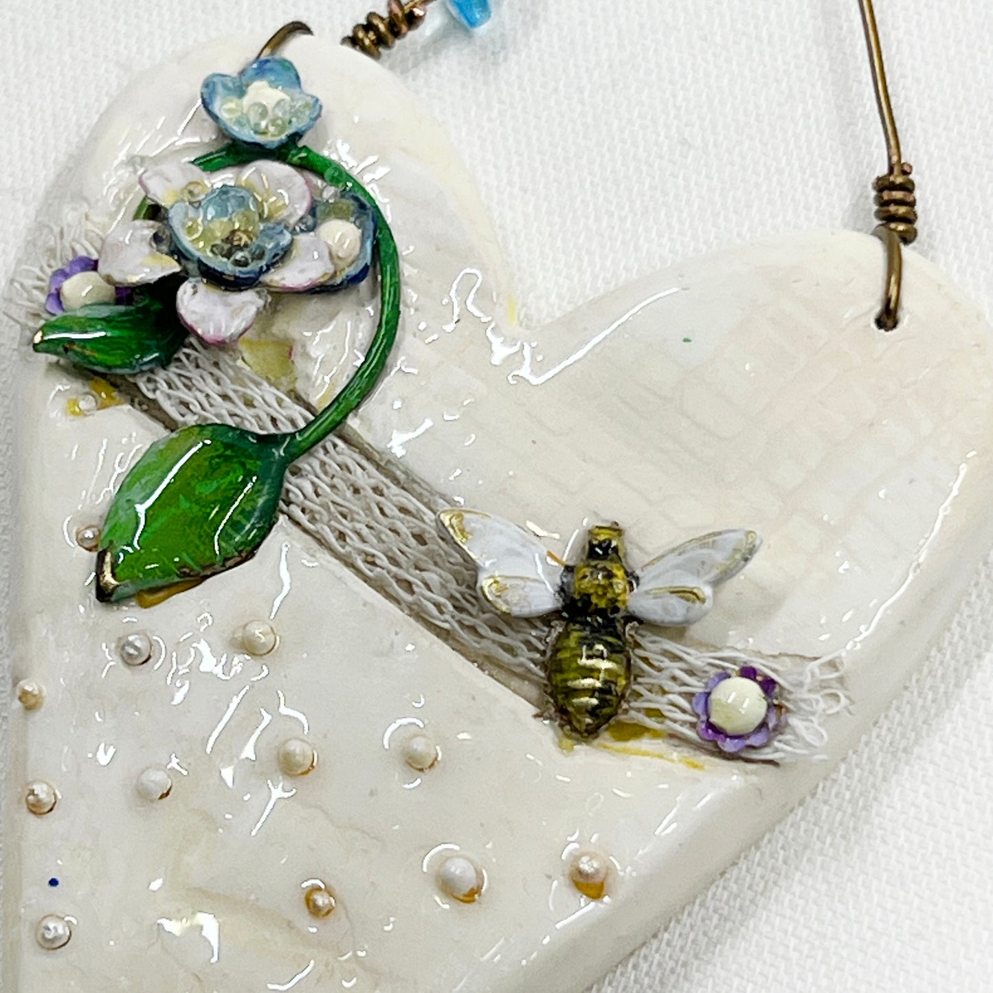 Handmade Heartfelt Ornament 14: hand sculpted heart with mixed media hand-painted enameled flowers by artist Tammy Tutterow
