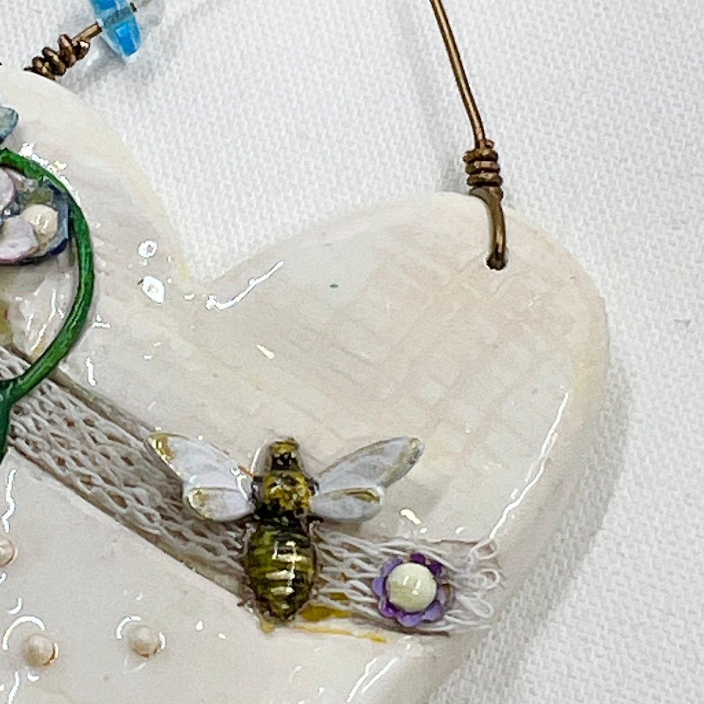 Handmade Heartfelt Ornament 14: hand sculpted heart with mixed media hand-painted enameled flowers by artist Tammy Tutterow