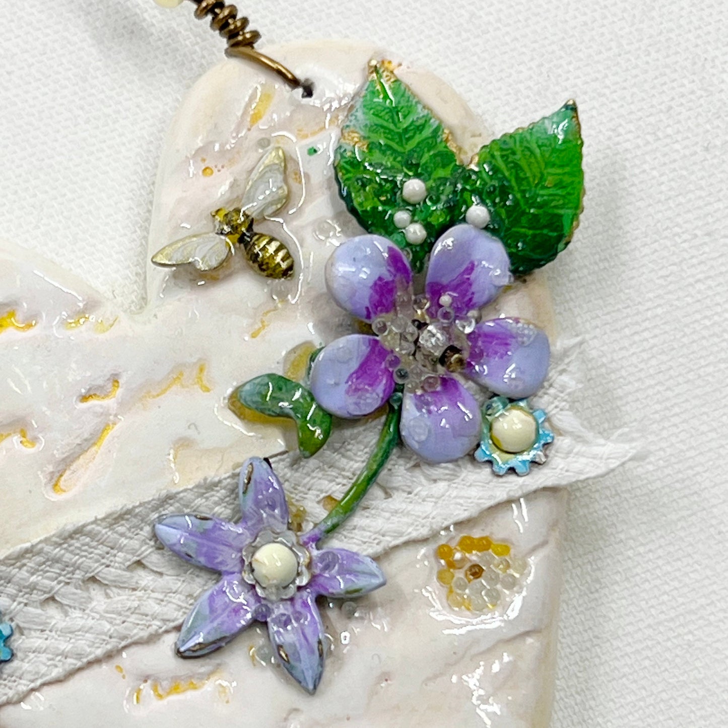 Handmade Heartfelt Ornament 16: hand sculpted heart with mixed media hand-painted enameled flowers by artist Tammy Tutterow